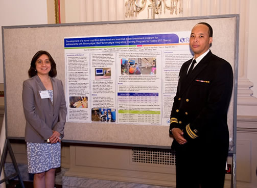 Photo of Drs. Kashikar-Zuck and Phil Tonkins at the OBSSR exhibition.