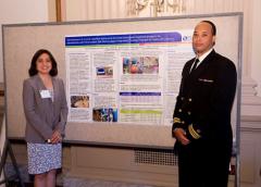 Photo of Drs. Kashikar-Zuck and Phil Tonkins at the OBSSR exhibition.