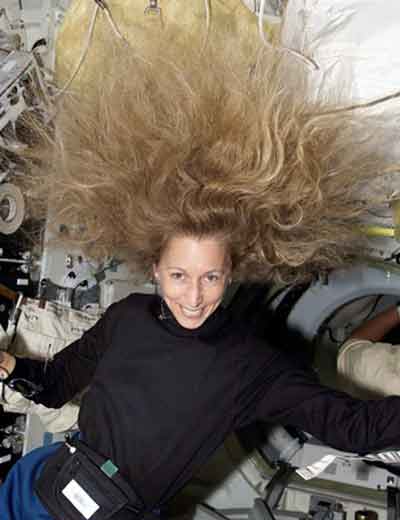 Woman with her hair floating in zero gravity
